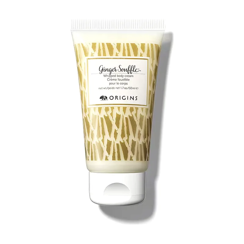 Origins Crema corporal nutritiva Ginger Souffle textura ligera y sedosa fórmula hidratante con aroma cálido y especiado ideal para piel suave 50 ml