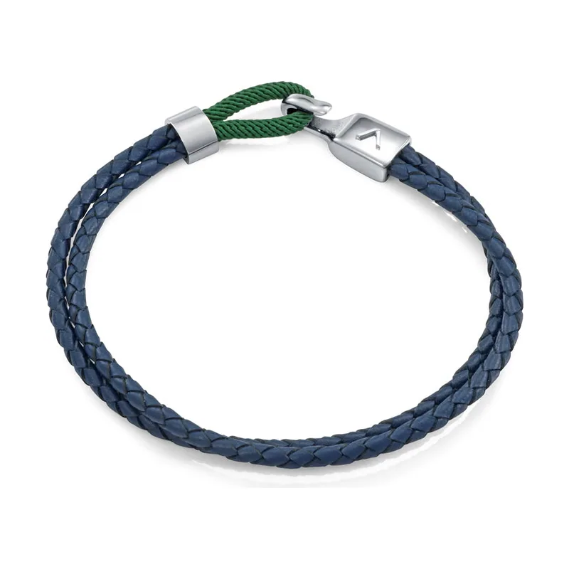Pulsera de acero y piel azul trenzada, con lazo de cordón verde. Largo 21,5 cm 75443P01013