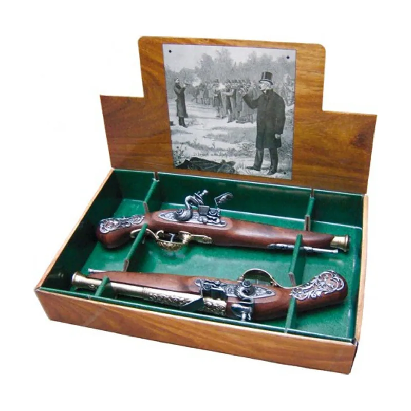 Caja de cartón con 2 reproducciones de pistola de chispa fabricadas en metal